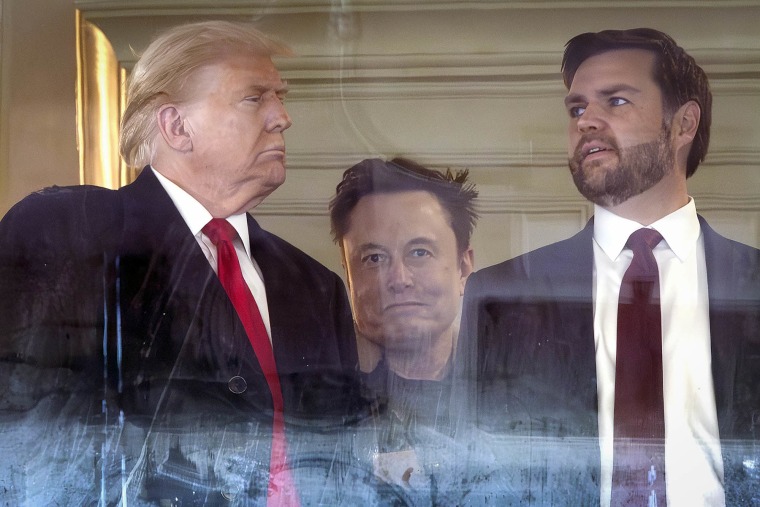 Donald Trump, Elon Musk and JD Vance attend the Army-Navy football game on Dec. 14, 2024 in Landover, Md.