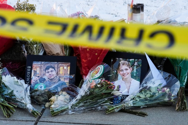 Shooter who killed Brown students, MIT professor had been planning for months and left videos, officials say 2 Photos of MukhammadAziz Umurzokov, left, and Ella Cook, are seen amongst flowers at a makeshift memorial outside on a sidewalk