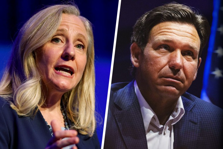 Virginia Gov.-elect Abigail Spanberger and Florida Gov. Ron DeSantis.