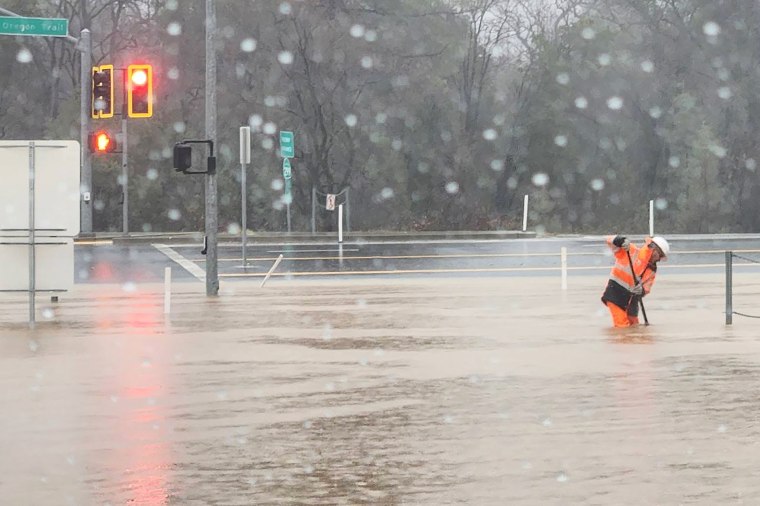 Flash floods on Old Oregon Trail in Redding, Calif., on Sunday.