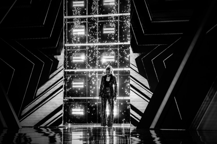 Erika Kirk walks on stage