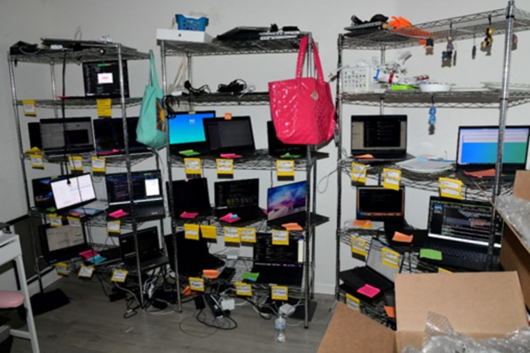 Christina Chapman organized and stored U.S. company laptops in her home, and included notes identifying the U.S. company and identity associated with each laptop.