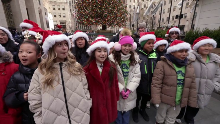 The Kids Care Club from P.S. 173 in Queens spread plenty of good cheer at New York City's Rockefeller Center.