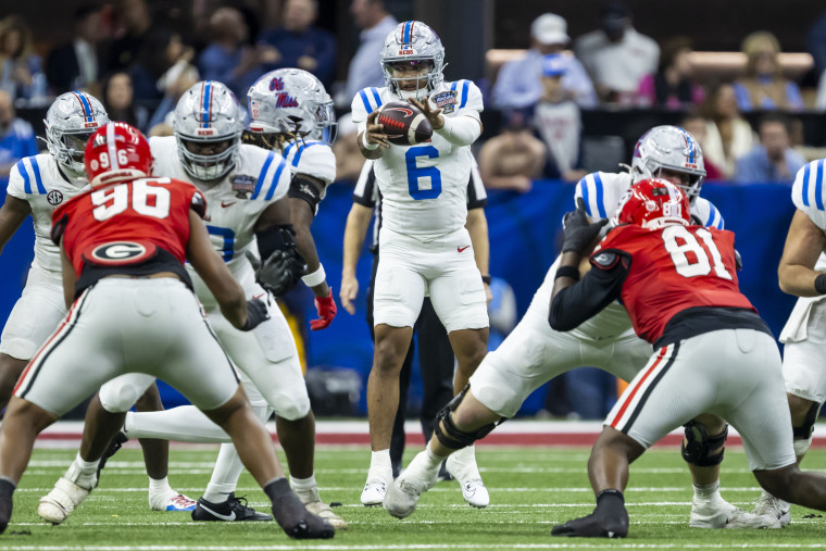 Ole Miss Rebels quarterback Trinidad Chambliss receives a snap during a game against the Georgia Bulldogs on Thursday January 1, 2026.