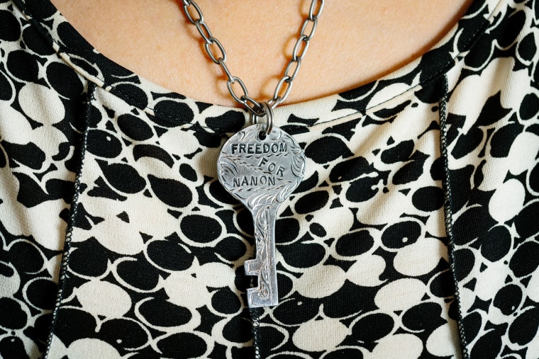 Nanon Williams' sister, Angela Grant Clayton. wears a pendant for Nanon.