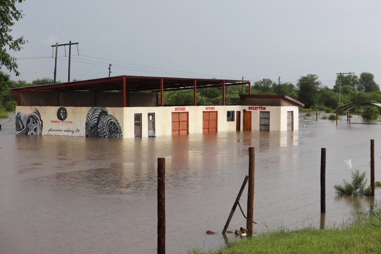 Image: TOPSHOT-CORRECTION / SAFRICA-WEATHER-FLOOD