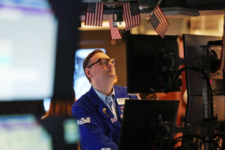 A trader works on the floor of the New York Stock Exchange on Jan. 20, 2026.