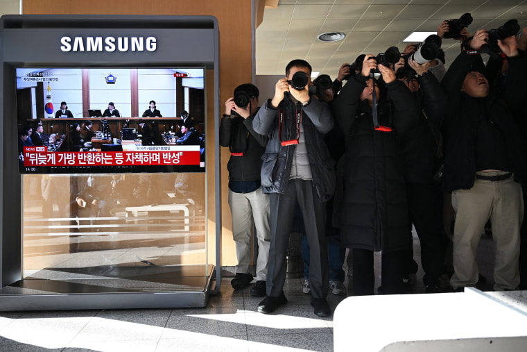 Image: TOPSHOT-SKOREA-POLITICS-CRIME-KIM