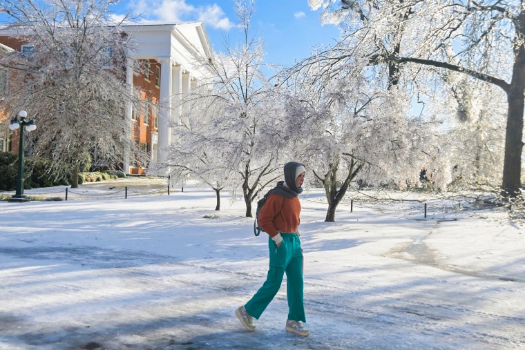 A woman walks across the campus of the University of Mississippi in Mississippi