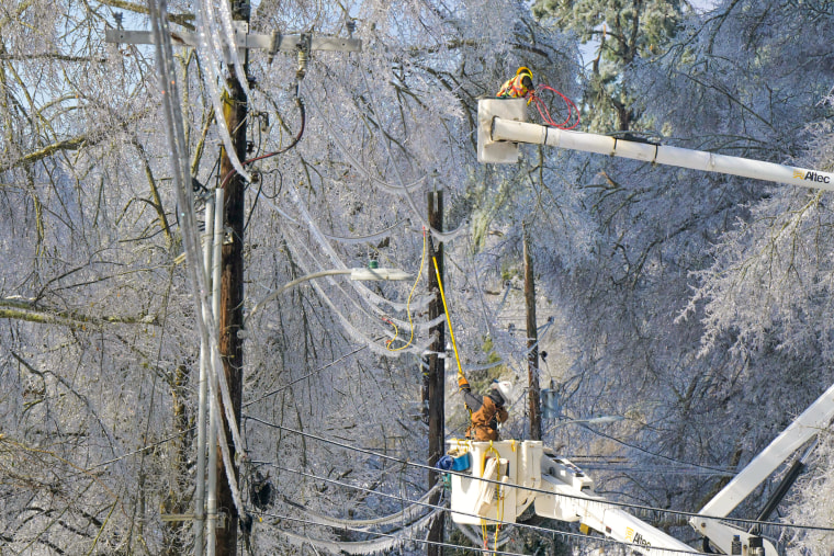 A lineman works to restore power in Mississippi.