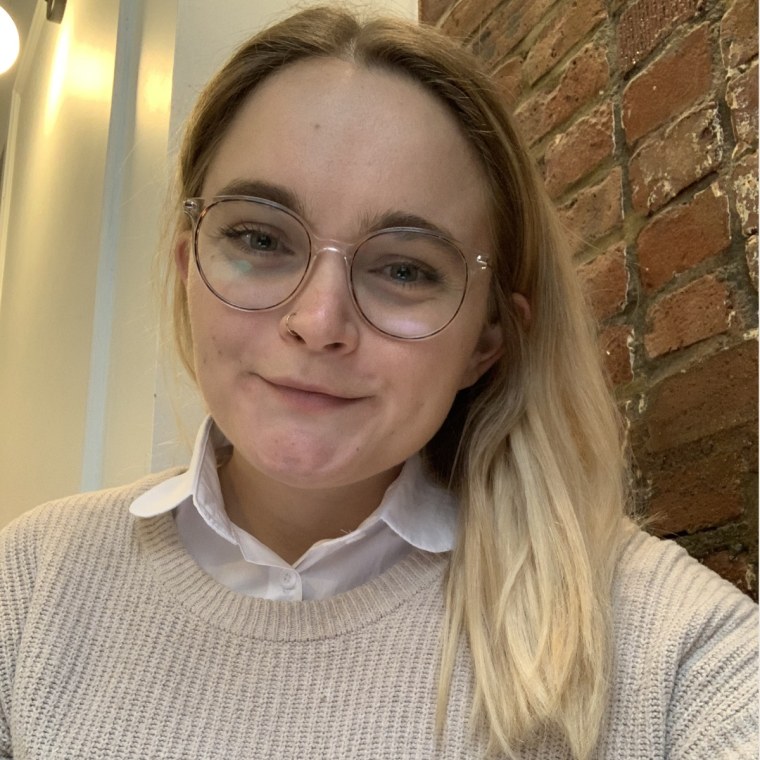 Writer Emma Stessman wears the Kalkehay Detachable Dickey Collar under a sweater.