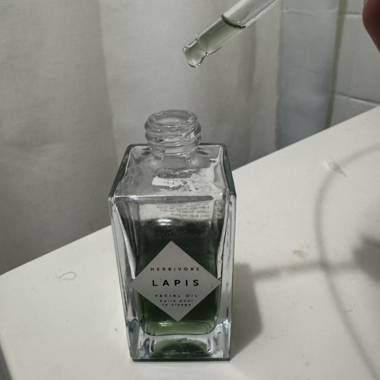 Facial oil bottle with dropper