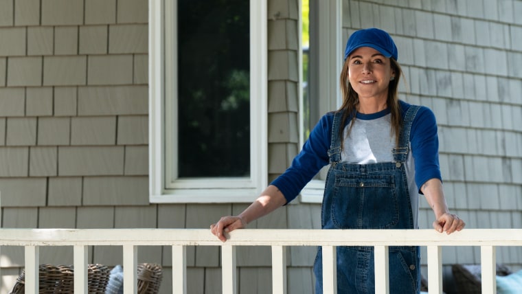 Liz da varanda de sua casa, que fica em Pasadena.