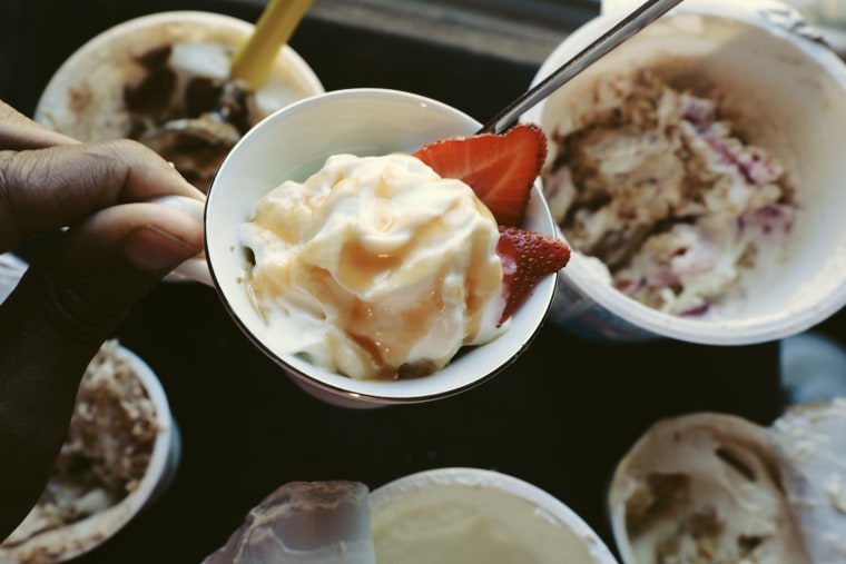 Japanese cheesecake yogurt made with biscoff cookies and Greek yogurt topped with whipped cream, caramel and strawberries.