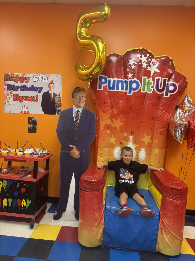 Ryan at his birthday party, which included a banner with him and Carter Photoshopped together and a life-size cut-out of the president. Plus, spot his shirt!