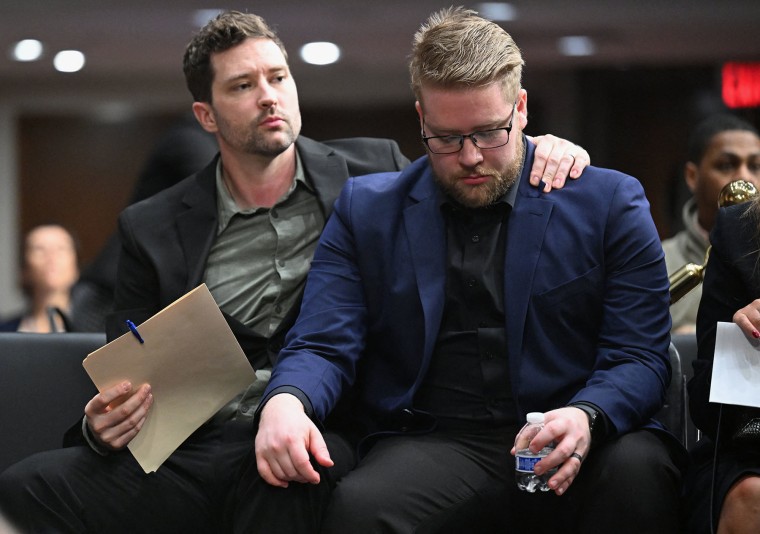 Luke Ganger and Brent Ganger, brothers of Renee Good, appear at a forum on use of force by Department of Homeland Security agents, on Capitol Hill in Washington, DC, on February 3, 2026. 