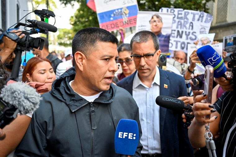 People and family members of detainees gather outside Venezuela's National Assembly