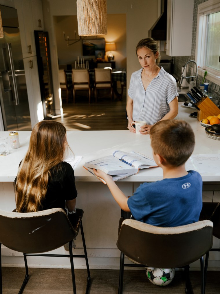 Julie Frumin and her two children, who are in 3rd grade and 6th grade, at their home in Thousand Oaks, Calif., on Feb. 5, 2026.