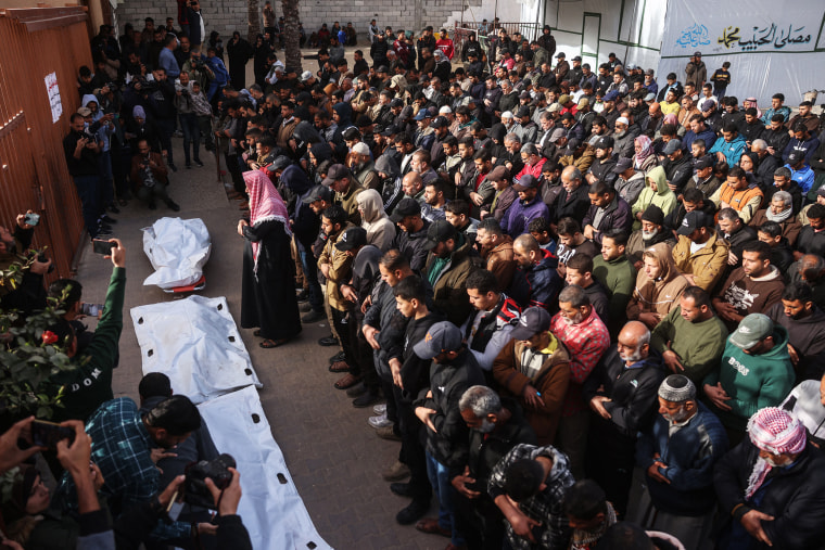 Palestinians mourners during the funeral of those killed in an overnight Israeli strike in Khan Younis, southern Gaza on Feb. 15, 2026.