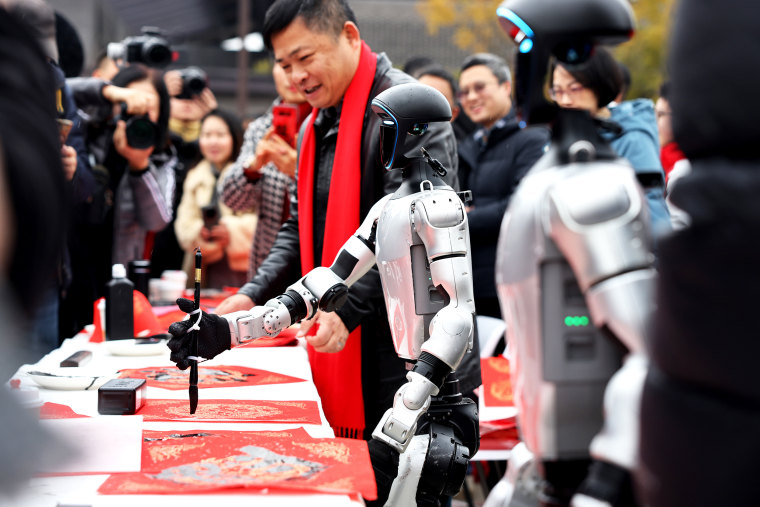 Humanoid Robots Write Spring Festival Couplets To Send Blessings In Chengdu