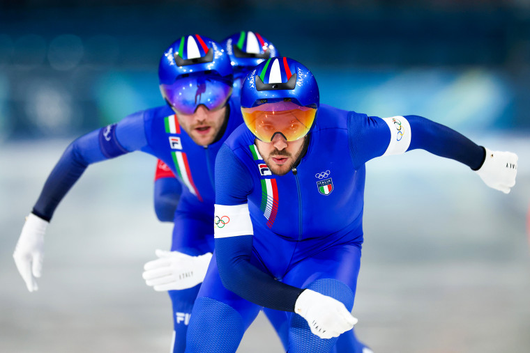 Davide Ghiotto and Michele Malfatti of Team Italy compete successful last A of the Speed Skating Men's Team