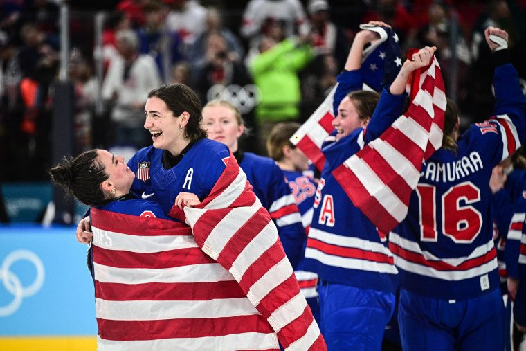 Team USA celebrates on the ice