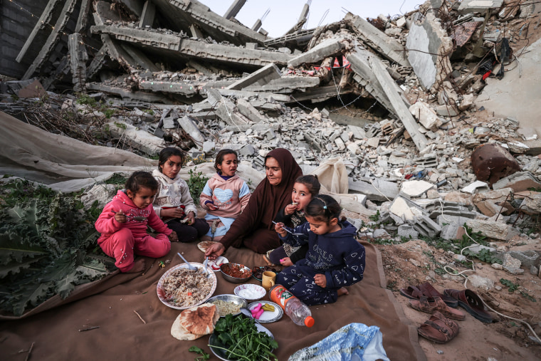 Palestinian family held their first iftar of Ramadan on the rubble of their destroyed home in Gaza