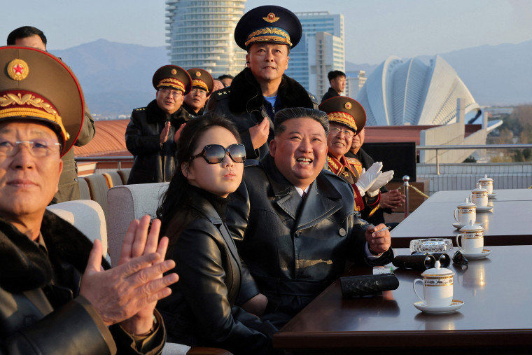 North Korean leader Kim Jong Un and his daughter Ju Ae watch an air show in Gangwon Province in Nov. 2025.