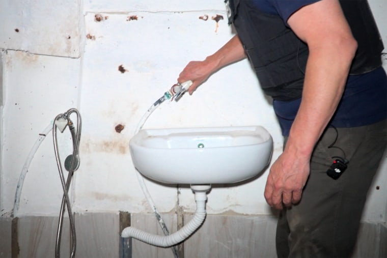 Image: A bathroom sink inside the tunnel