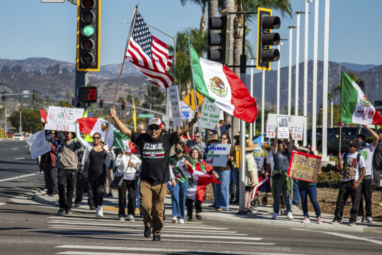 Residents protest ICE deportations on February 2, 2025, in Escondido, Calif.