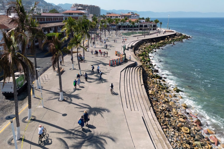 An aerial view of the boardwalk inPuerto Vallarta, people walk on the strip near the ocean