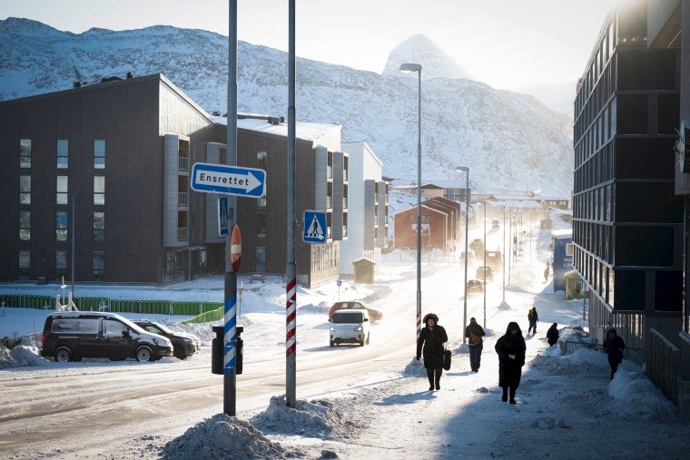 The sun rises over the snow-covered streets of Nuuk, Greenland, on Feb. 25, 2026. 