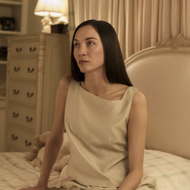 Sydney Lemmon como Lauren Bessette