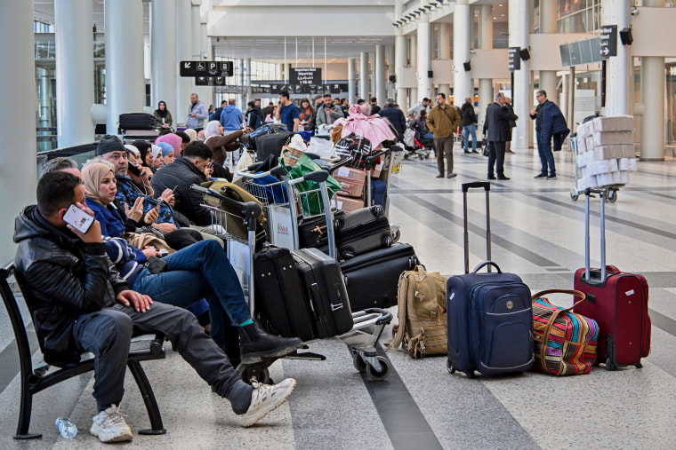 People stranded at airport.