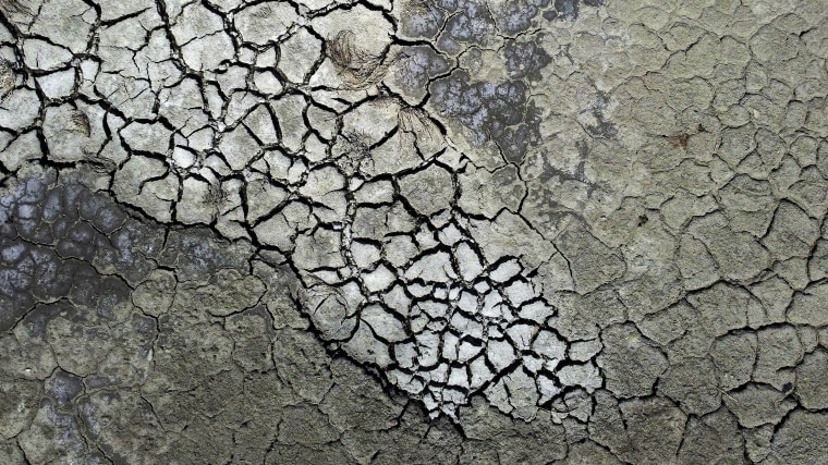 Dried cracked mud is visible at the Antelope Island Marina