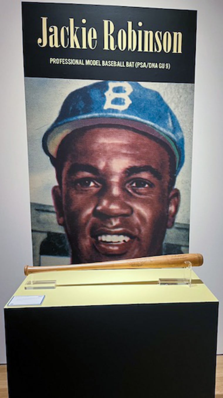 Jackie Robinson's professional model baseball bat displayed at Christie's.