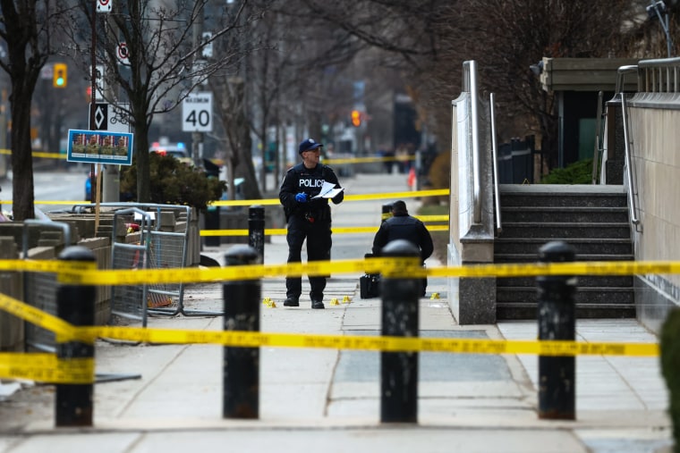 Police at the scene after shots were fired at the U.S. Consulate in Toronto on March 10, 2026. 