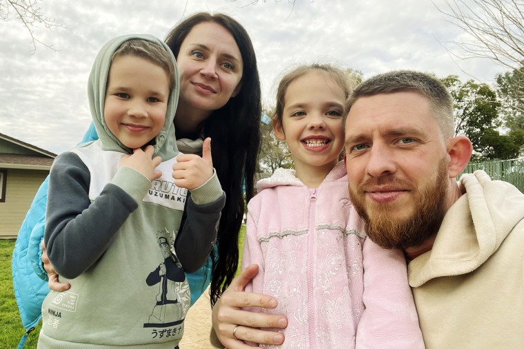 Alexey, his wife Anastasia and their two children.