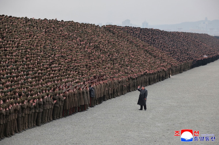 North Korean leader Kim Jong Un participates in a photo session with soldiers who were involved in the construction of the a greenhouse farm in North Pyongan Province on Feb. 1, 2026. 
