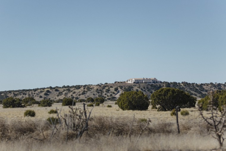 Epstein's mansion loomed over dry grasslands, miles from its nearest neighbors.
