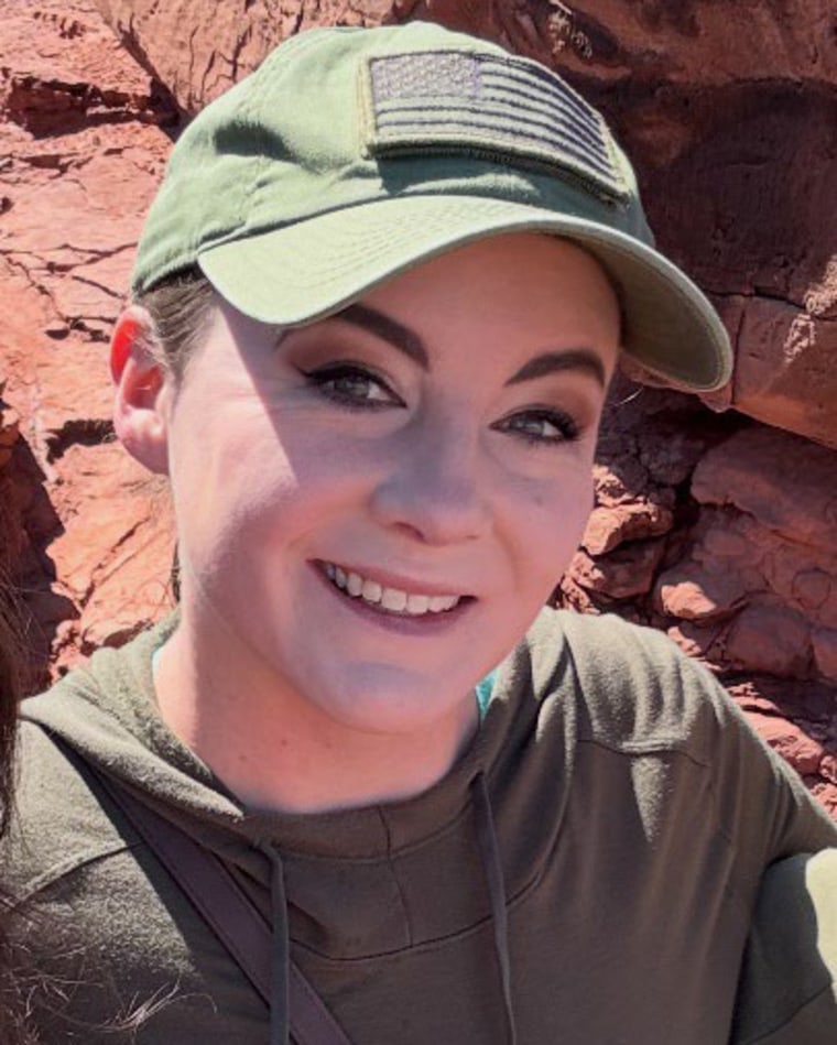 Ashley B. Pruitt smiles outside