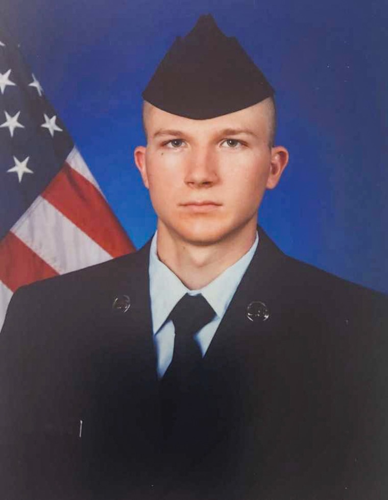 Curtis J. Angst smiles in a portrait