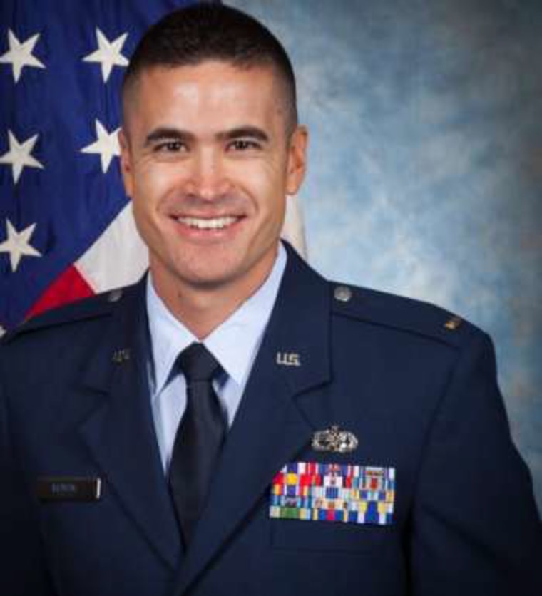 Seth R. Koval smiles in a portrait