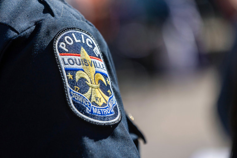 A Louisville police department patch is seen on the shoulder of an officer's shirt