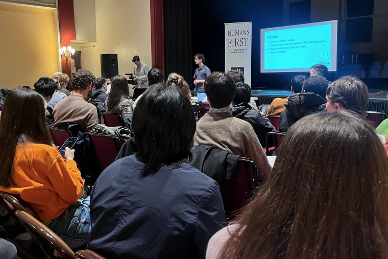 Jeremy Ornstein, a movement strategist at Humans First, explains the main campaign points with participants in New York.