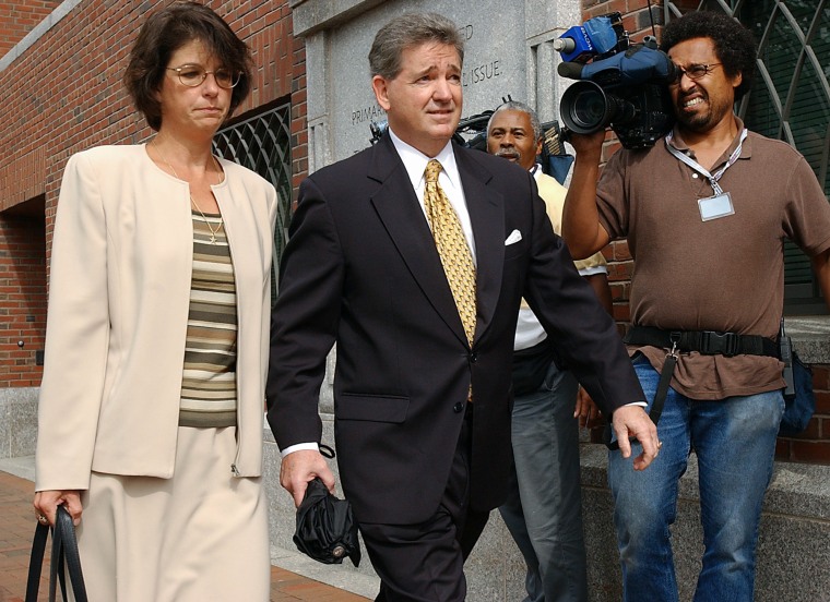 With his lawyer, Tracy Miner, on his side, former FBI agent John Connolly walks to Federal Court amongst the media.