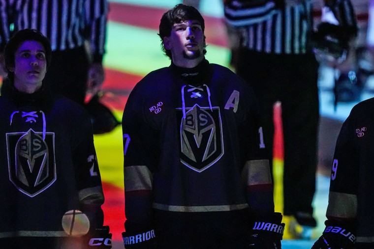 Colin Dorgan stands with teammates before Wednesday's game.