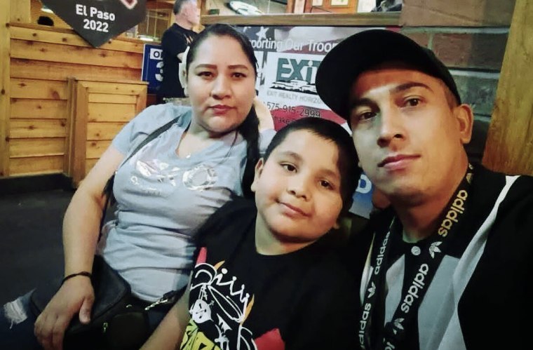 Deiver with his parents.