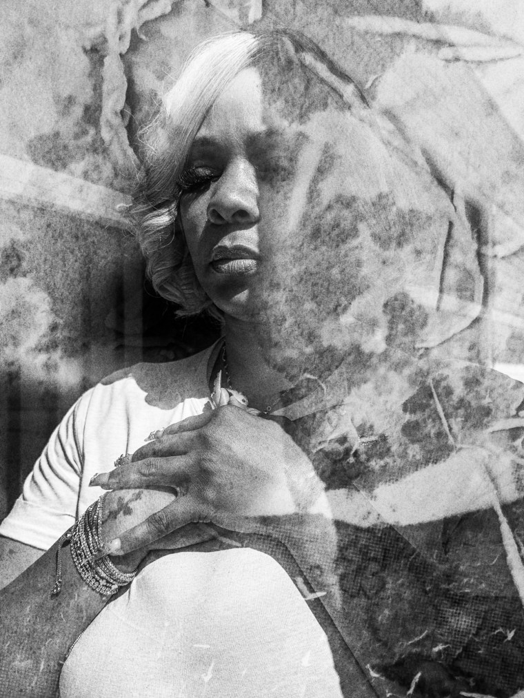 A black and white photo collage shows a photo of a Black woman with blonde hair with her hands clasped across her chest. In a double exposure effect, a photo is overlaid on the photo of the woman that has a mottled texture.