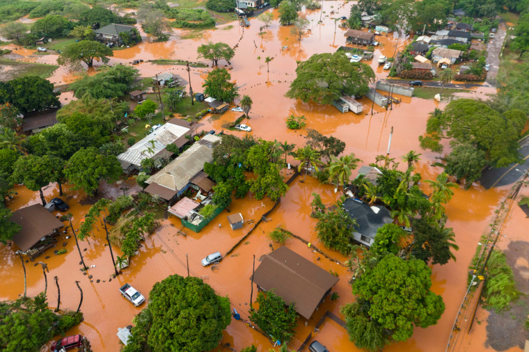 Fooding covers a residential neighborhood in Waialua, Oahu, Hawaii, Friday, March 20, 2026. 